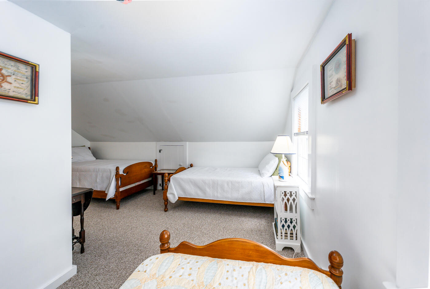 264 Route 28 Harwich, MA 02646 - Photo 34 of 39 a bedroom with furniture and a wooden floor