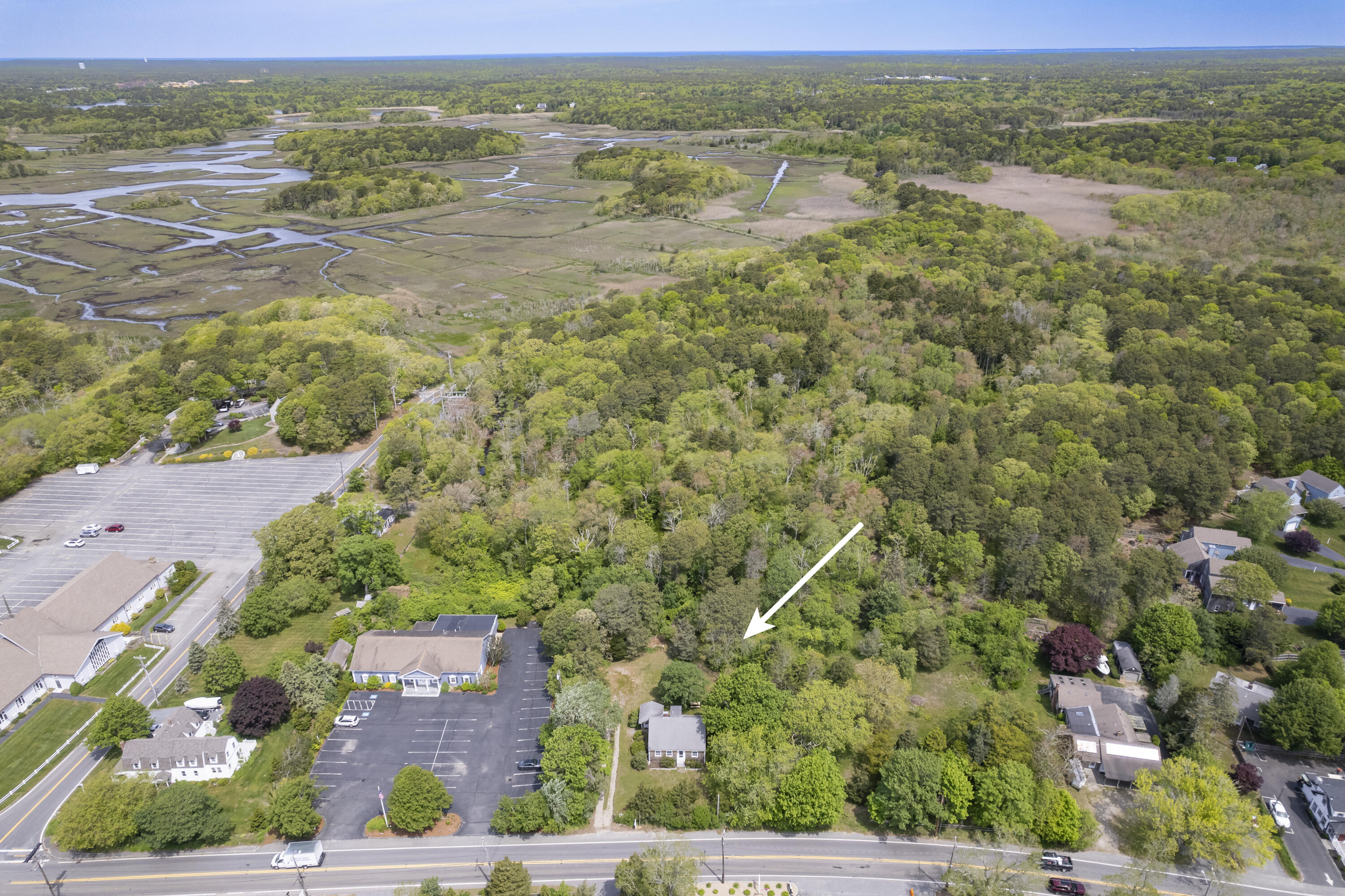 264 Route 28 Harwich, MA 02646 - Photo 38 of 39 an aerial view of residential houses with outdoor space and trees