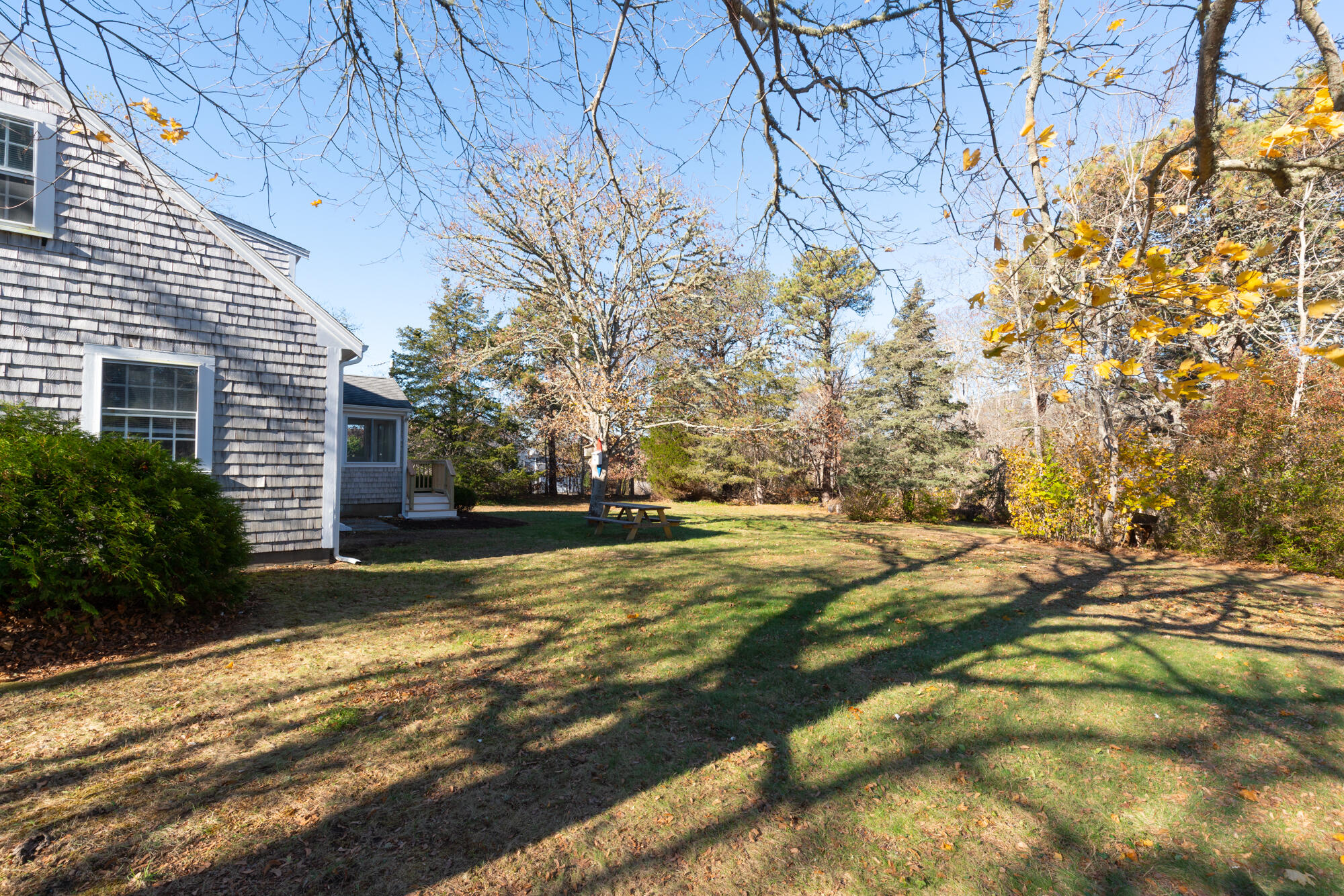 264 Route 28 Harwich, MA 02646 - Photo 5 of 39 a view of a house with a yard and garage