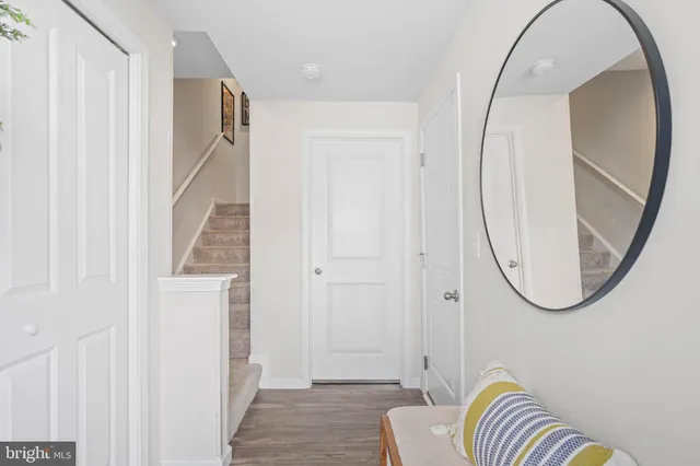 a kitchen with stainless steel appliances granite countertop a sink stove and microwave