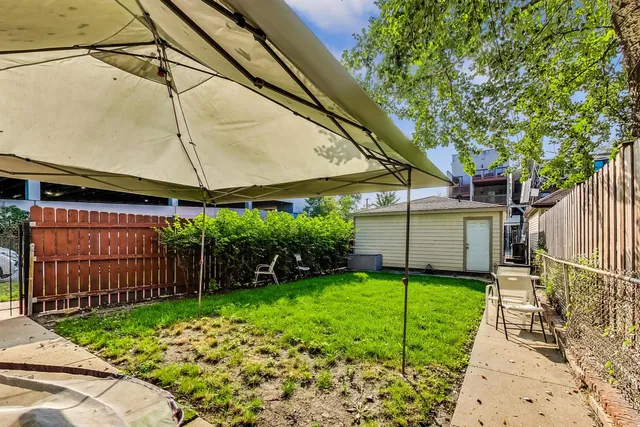 a view of a backyard with plants