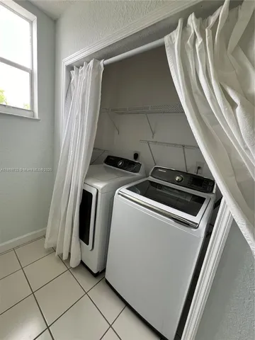 a view of an entryway with staircase