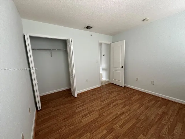 a bathroom with a sink and a shower