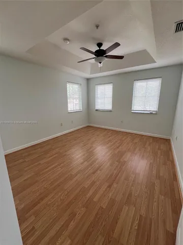 a view of a bathroom from a hallway