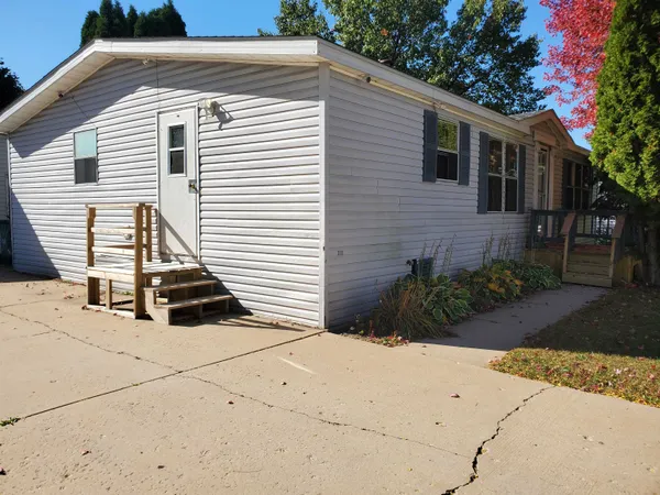 a view of a back yard of the house
