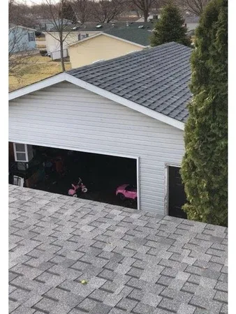 a view of a backyard of the house