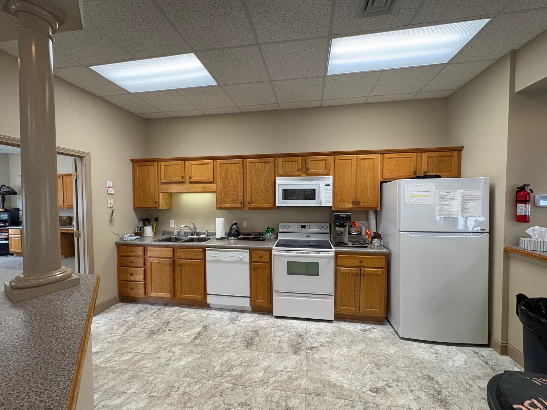 73 Kavanaugh Road, Unit 73 Old Orchard Beach, ME 04064 - Photo 31 of 32 new clubhouse kitchen 330