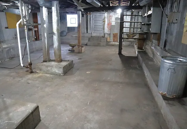a view of a garage with wooden floor