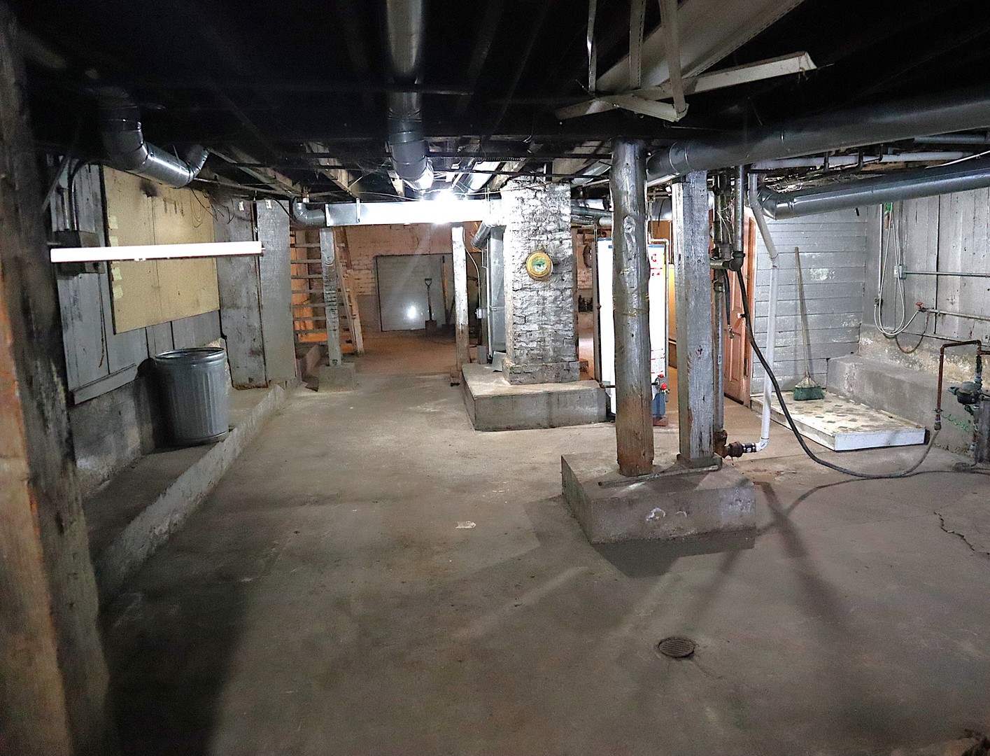 1934 West 21st Place Chicago, IL 60608 - Photo 14 of 25 a view of a garage with wooden floor