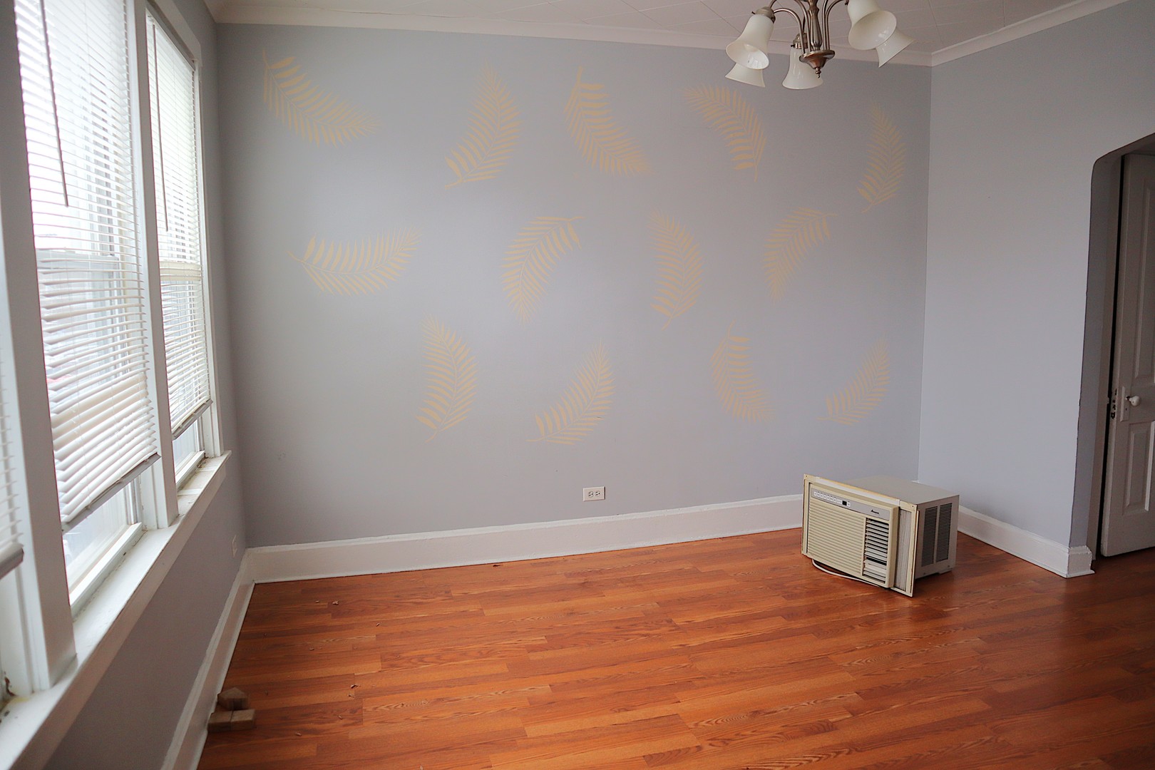 1934 West 21st Place Chicago, IL 60608 - Photo 18 of 25 a view of room with window and wooden floor