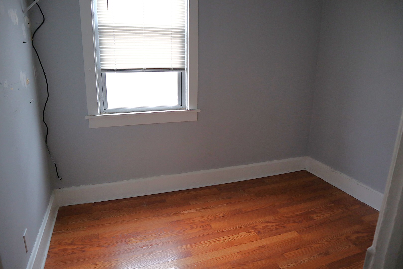 1934 West 21st Place Chicago, IL 60608 - Photo 23 of 25 an empty room with a window