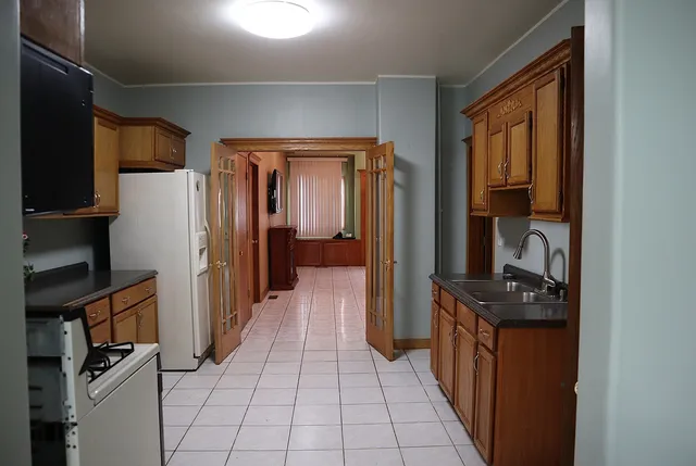 a hallway with cabinets