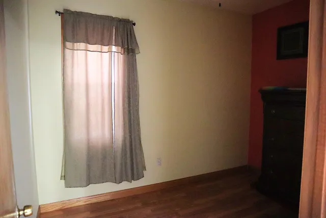 a bathroom with a toilet and a sink