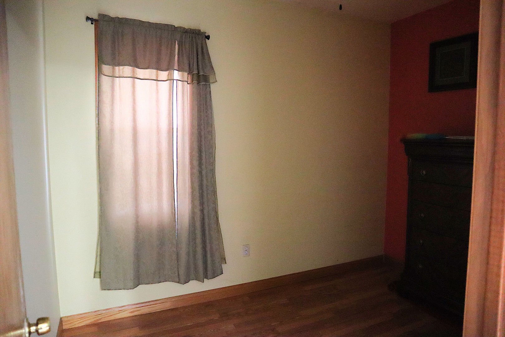 1934 West 21st Place Chicago, IL 60608 - Photo 8 of 25 an empty room with wooden floor and windows