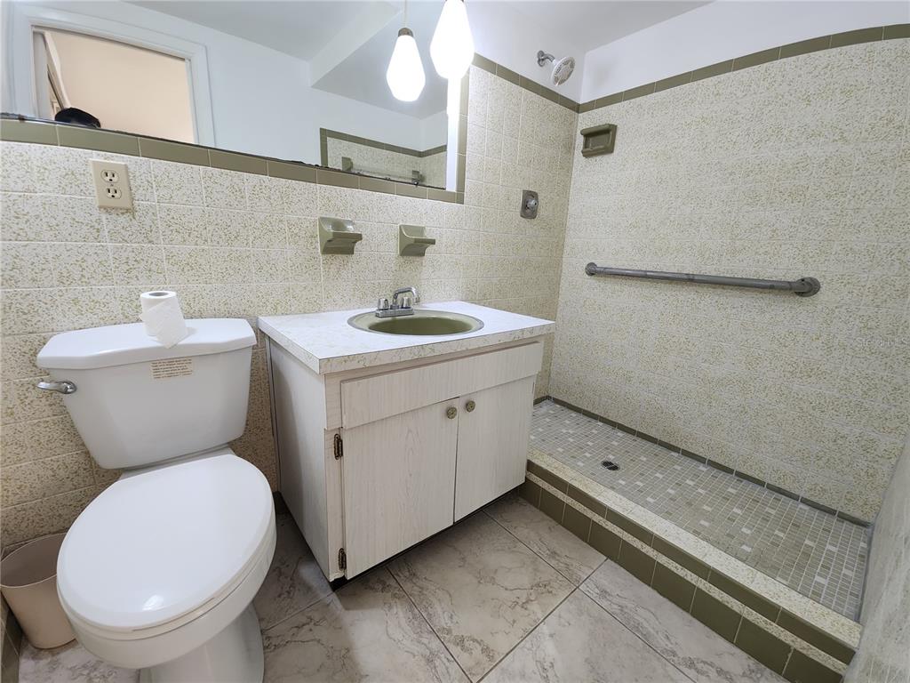 7721 Foxbloom Drive Port Richey, FL 34668 - Photo 11 of 15 a utility room with dryer and washer