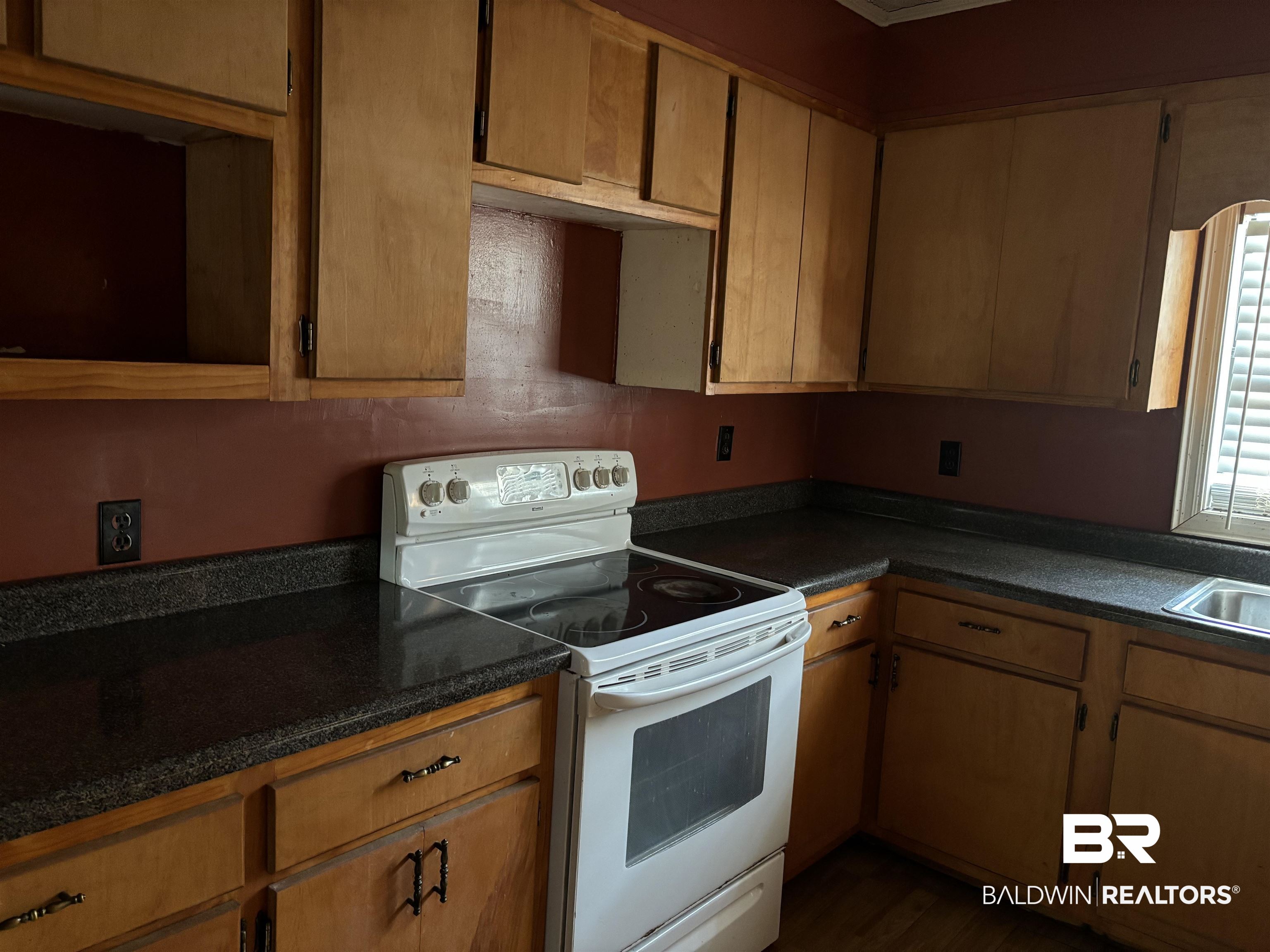17495 County Road 48 Robertsdale, AL 36567 - Photo 20 of 37 Kitchen featuring electric stove and dark hardwood / wood-style flooring