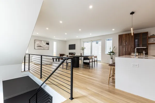 a view of a living room and dining room