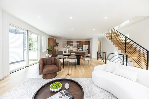 a living room with furniture and a table