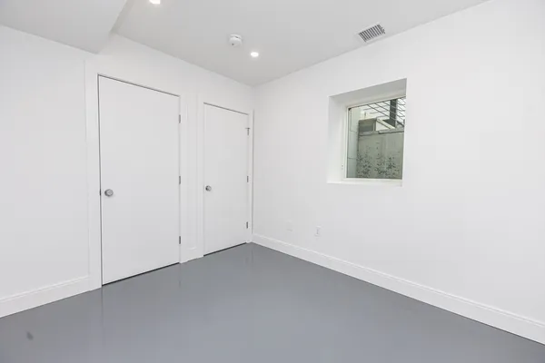 an empty room with a hallway