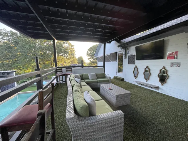 a outdoor living space with furniture and garden view