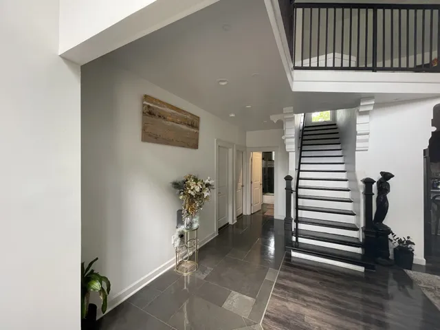 a view of a hallway with entryway