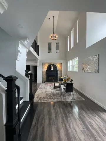 a kitchen with a table and chairs
