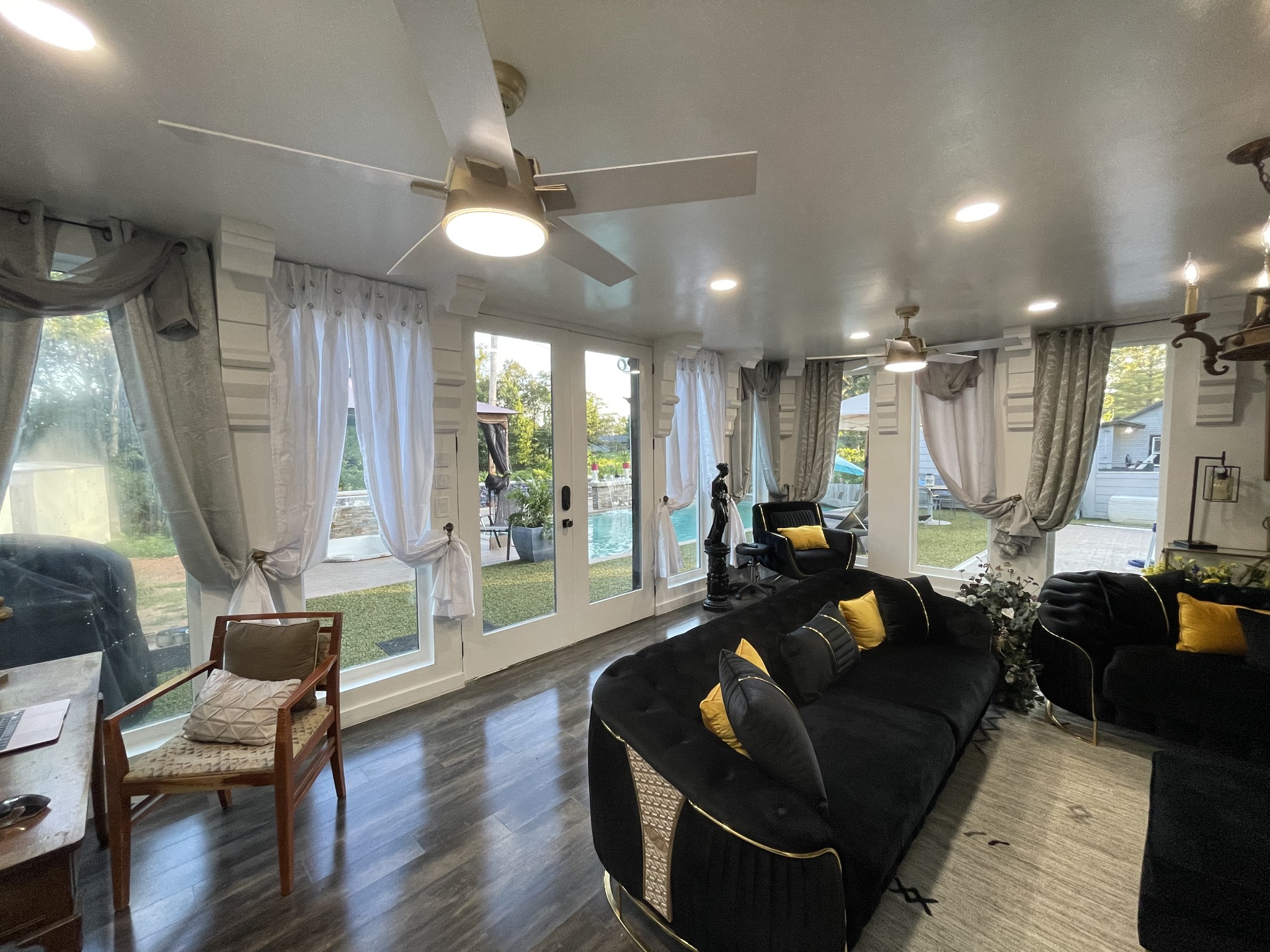 1150 Lafayette Road Clarksville, TN 37042 - Photo 7 of 24 a living room with furniture a large window and wooden floor