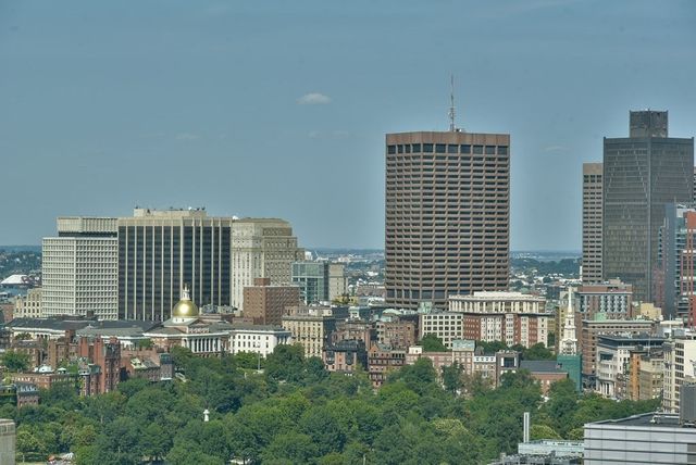 a view of a city with tall buildings