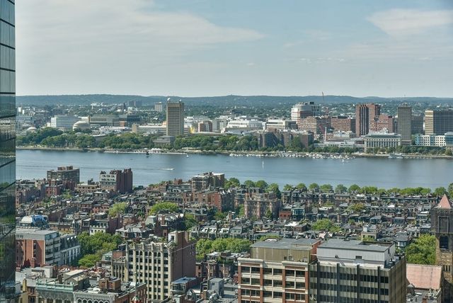 an aerial view of a city with houses