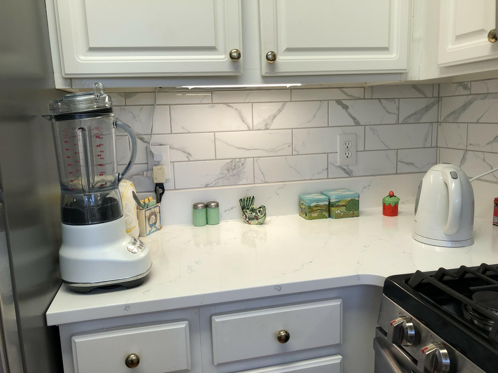 5601 Fairview Road, Unit 26 Charlotte, NC 28209 - Photo 11 of 22 a kitchen with a sink and cabinets
