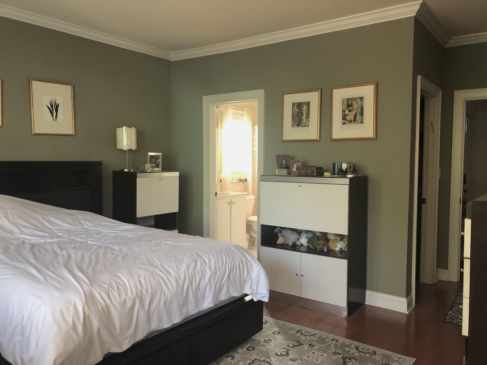 5601 Fairview Road, Unit 26 Charlotte, NC 28209 - Photo 13 of 22 a bedroom with a bed and a dresser with mirror