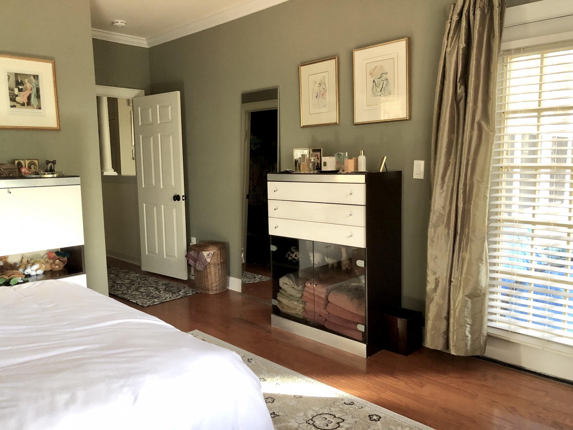 5601 Fairview Road, Unit 26 Charlotte, NC 28209 - Photo 14 of 22 a bedroom with a bed and wooden floor