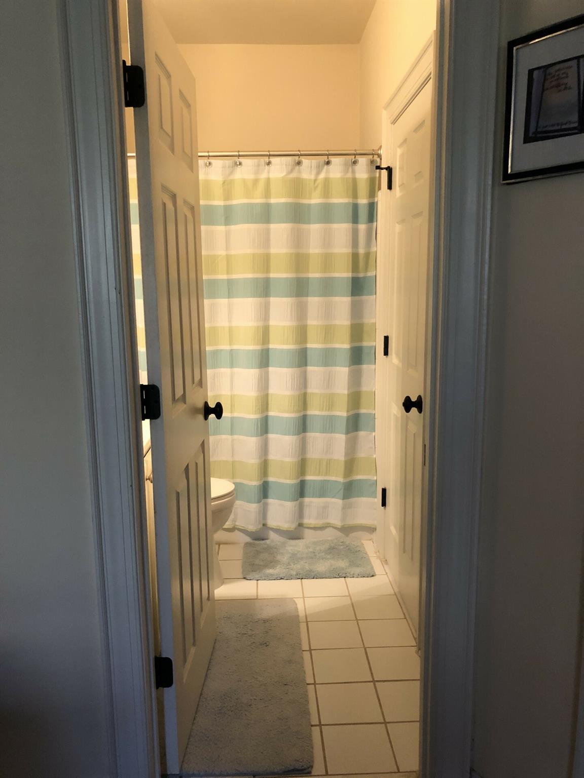 5601 Fairview Road, Unit 26 Charlotte, NC 28209 - Photo 18 of 22 a bathroom with a shower