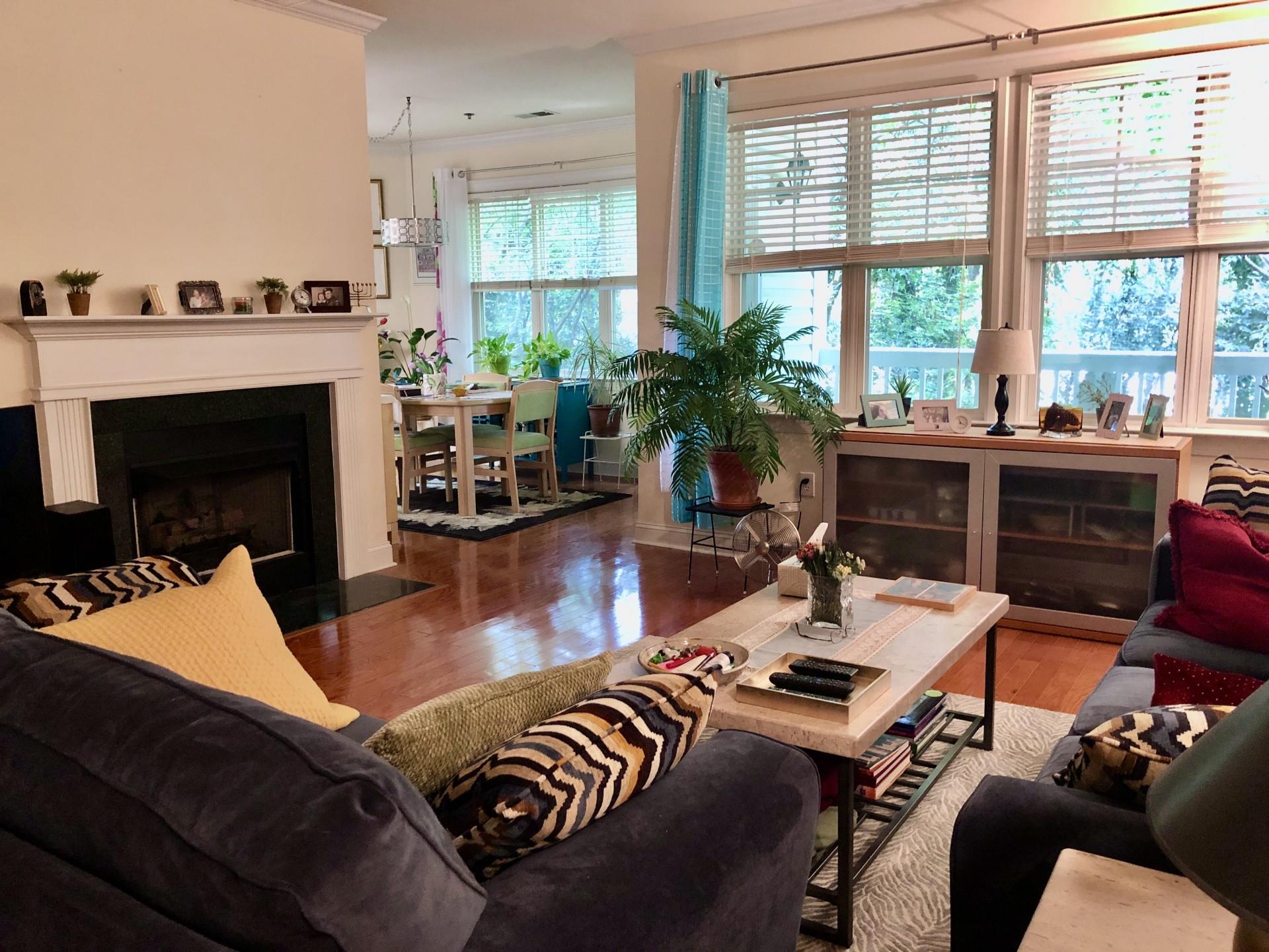 5601 Fairview Road, Unit 26 Charlotte, NC 28209 - Photo 2 of 22 a living room with furniture large window and a fireplace