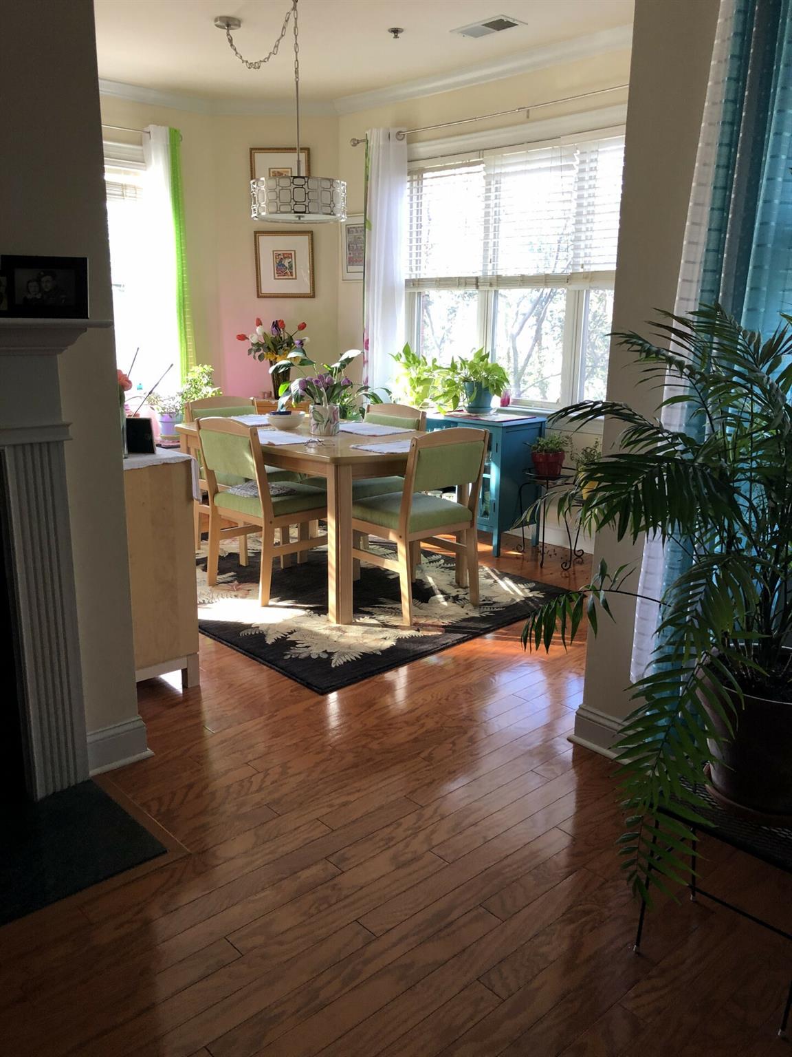 5601 Fairview Road, Unit 26 Charlotte, NC 28209 - Photo 6 of 22 a living room with furniture a window and kitchen view
