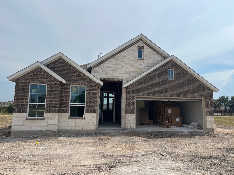 105 Sandrock Trail Georgetown, TX 78633 - Photo 1 of 1 a view of a house with a yard and garage