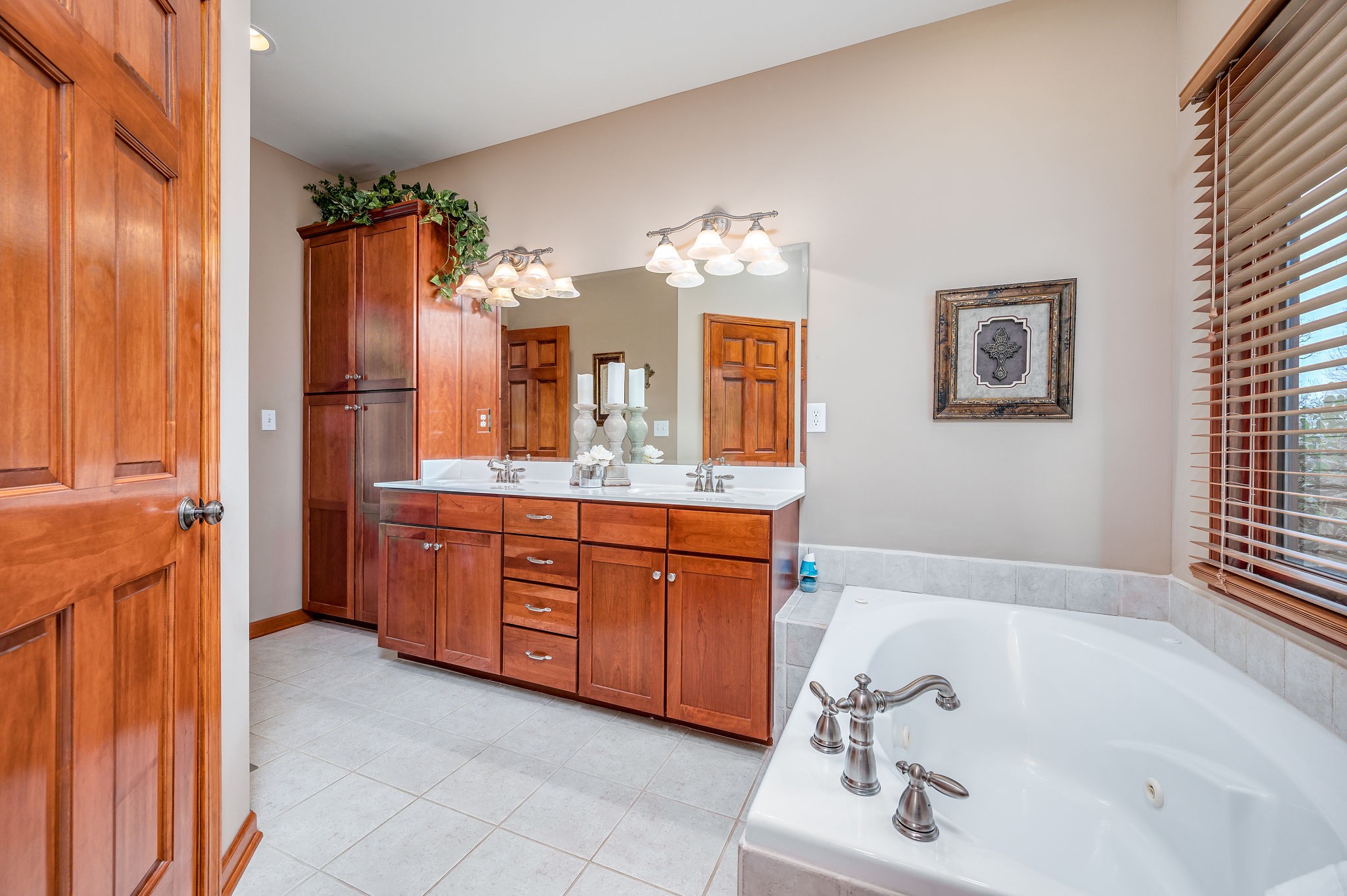 60 Lakeside Estates Road Springville, TN 38256 - Photo 17 of 49 a bathroom with a tub sink and mirror