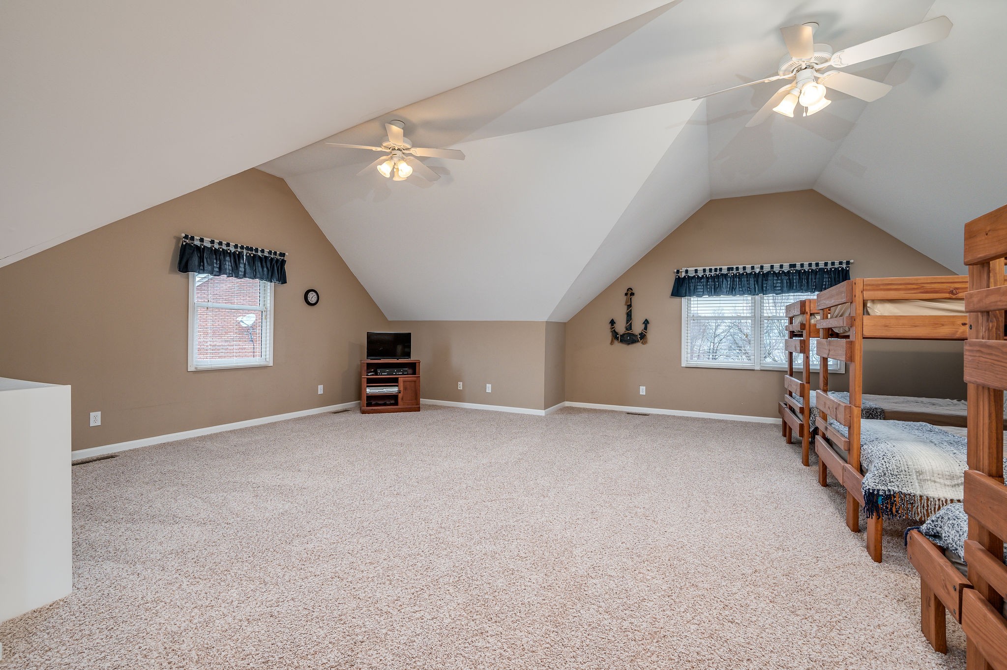 60 Lakeside Estates Road Springville, TN 38256 - Photo 21 of 49 a view of a livingroom with a furniture and a ceiling fan