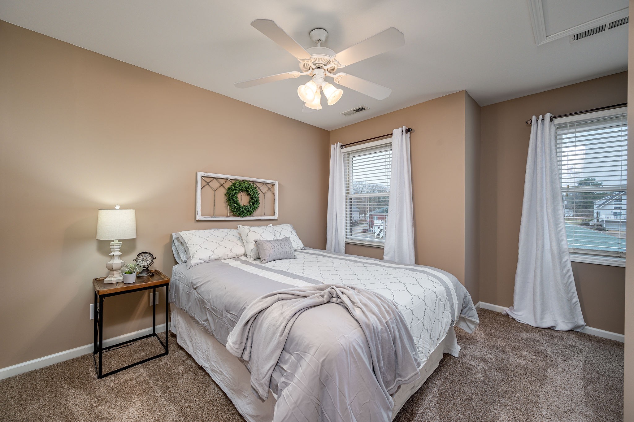 60 Lakeside Estates Road Springville, TN 38256 - Photo 23 of 49 a bedroom with a large bed and a window