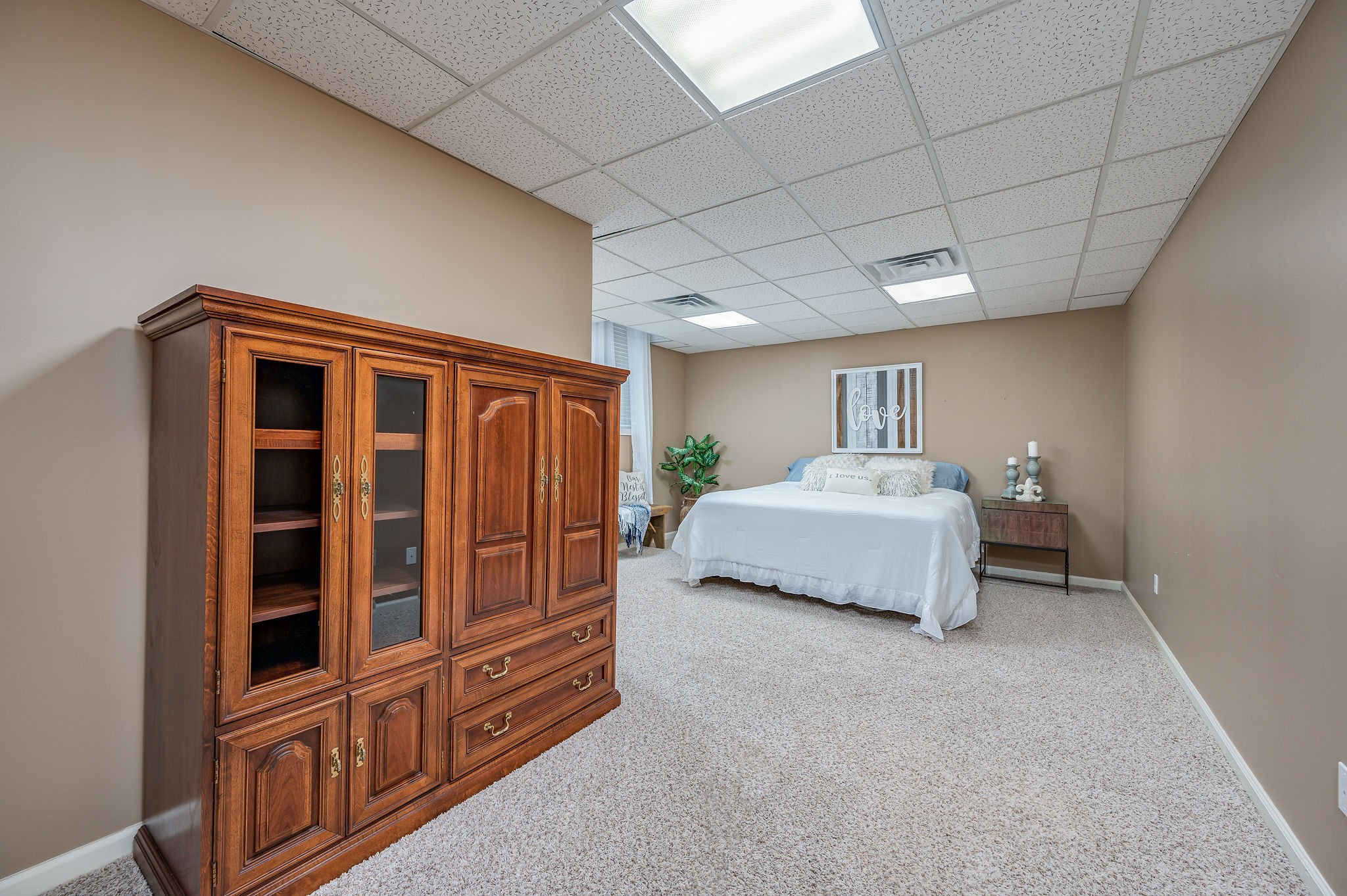 60 Lakeside Estates Road Springville, TN 38256 - Photo 28 of 49 a spacious bedroom with a bed and a window