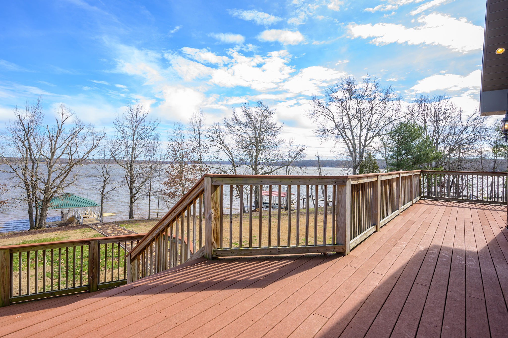 60 Lakeside Estates Road Springville, TN 38256 - Photo 41 of 49 a balcony with wooden floor and fence