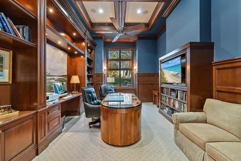 a view of a livingroom with furniture and closet area