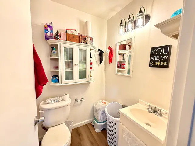 a bathroom with a sink and toilet