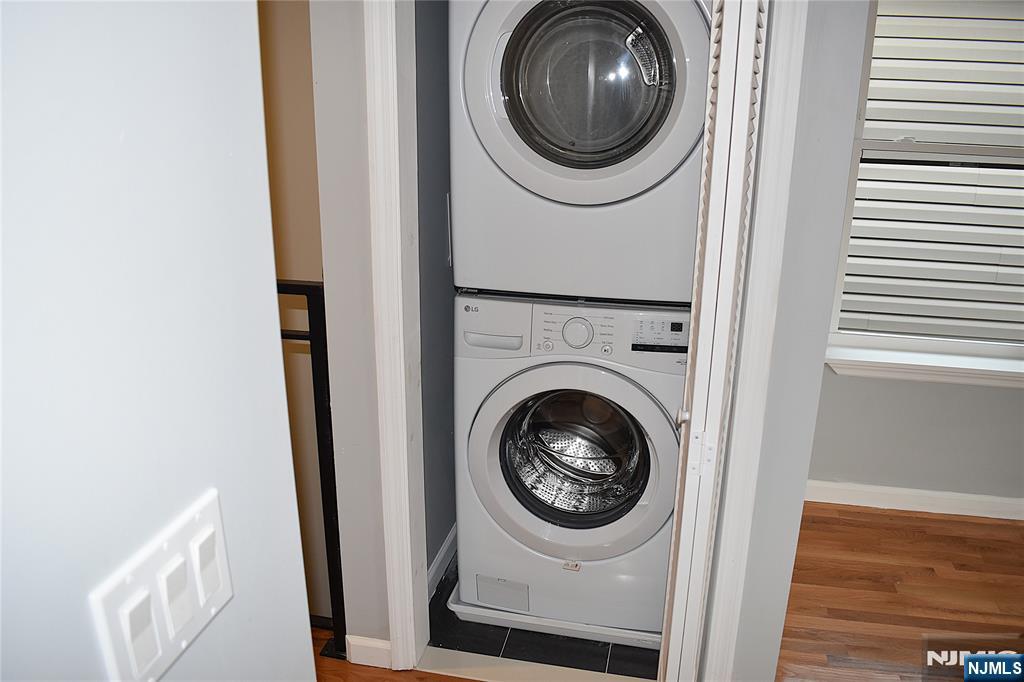593 South 18th Street Newark, NJ 07103 - Photo 5 of 16 a view of a hallway with washer and dryer