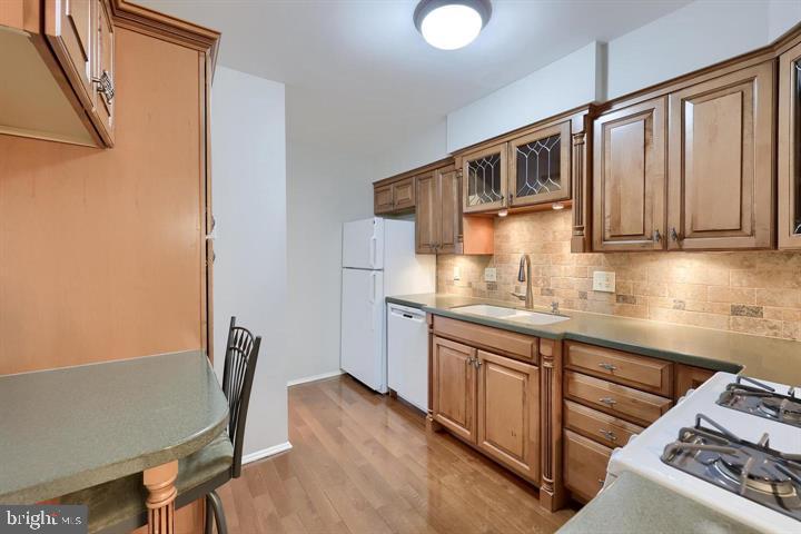 4 Valleybrook Drive Lancaster, PA 17601 - Photo 12 of 19 a kitchen with stainless steel appliances granite countertop a stove top oven a sink and dishwasher