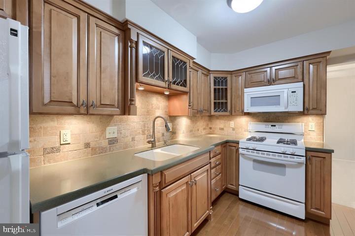 4 Valleybrook Drive Lancaster, PA 17601 - Photo 10 of 19 a kitchen with stainless steel appliances granite countertop a sink stove and cabinets