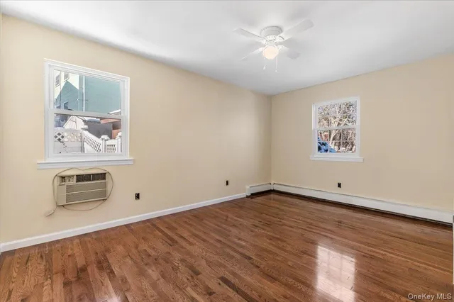 wooden floor in a room with a window