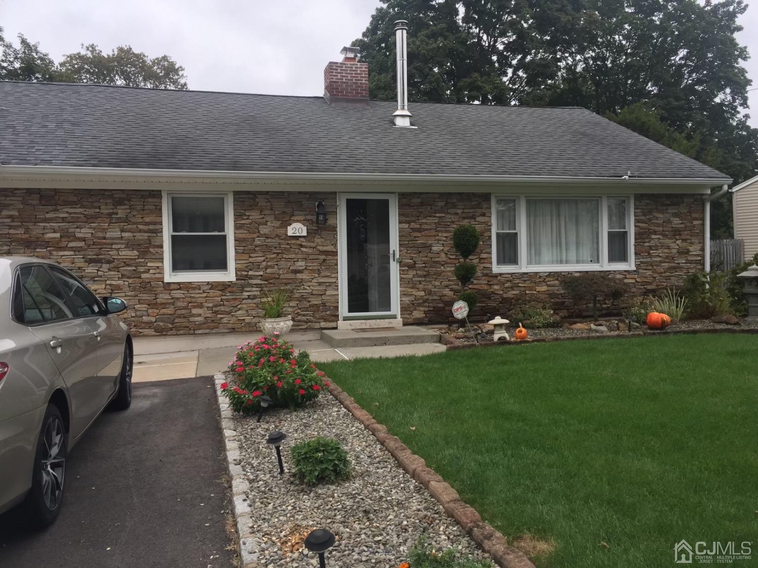 20 Ramsey Road Middlesex, NJ 08846 - Photo 1 of 33 a front view of a house with garden