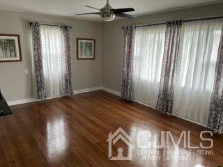 20 Ramsey Road Middlesex, NJ 08846 - Photo 11 of 33 a view of empty room with wooden floor