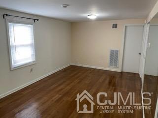 20 Ramsey Road Middlesex, NJ 08846 - Photo 19 of 33 a view of a door with wooden floor